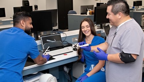 dental students with teacher