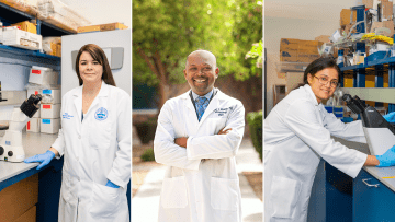 Kristina Martinez-Guryn, Ph.D., RD, Adebayo James Molehin, Ph.D., M.S., and Gwendolyn Pais, Ph.D., Research Assistant Professor in white coats.