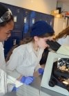 Home-schooled students experience labs at Midwestern University.
