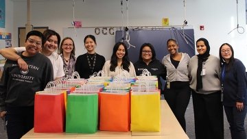 OT Group picture with packed snacks