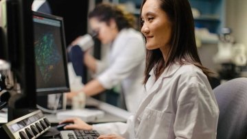 Student sitting at computer in lab