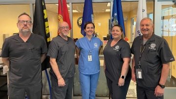 Midwestern Staff and Faculty Military Veterans who work at thse Dental Institute, from left to right: Don Touvell, Dental Lab Coordinator; Wes Reynolds, Dental Lab Manager; Melanie Bauer, D.M.D., Asistant Professor; Ashley Madern, D.M.D., Assistant Professor; Larry Johns, D.D.S., M.S.D., Assistant Professor