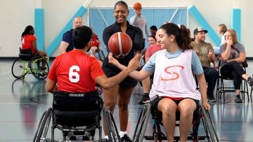 Wheelchair Basketball players in gym.