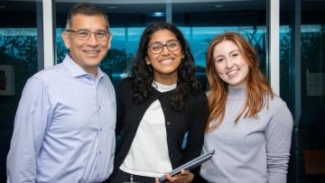 Dr. Henderson takes a photo with the medical students at the suicide prevention training.