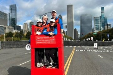 Medical students in the booth, serving as spotters in the Chicago Marathon. 