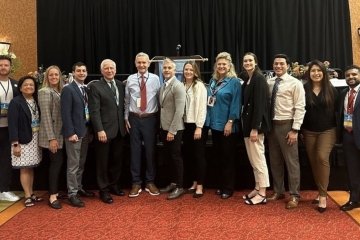 Faculty and students from the College of Dental Medicine-Illinois take a photo at the IL State Dental Society Annual Meeting.