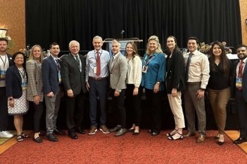 Faculty and students from the College of Dental Medicine-Illinois take a photo at the IL State Dental Society Annual Meeting.