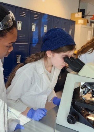 Home-schooled students experience labs at Midwestern University.