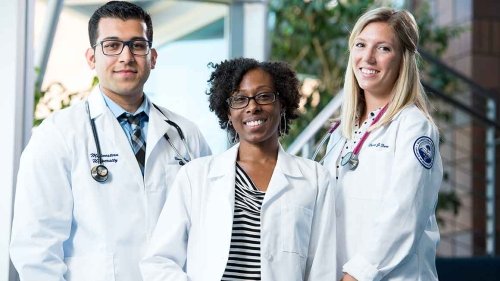 Students in white coats