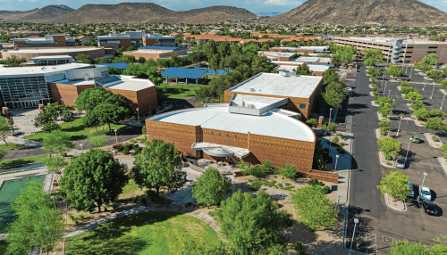 Aerial view of the Glendale campus showing hills in the background.