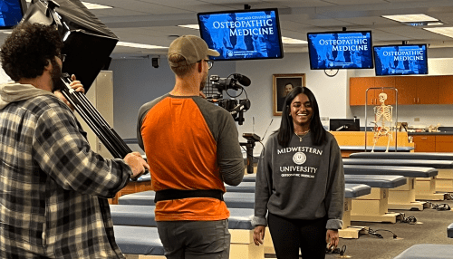 Vani Ganesh being filmed in the osteopathic medicine lab at Midwestern University.