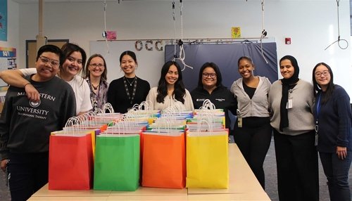 OT Group picture with packed snacks