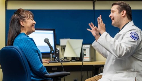 Speech-Language program student working with a patient.