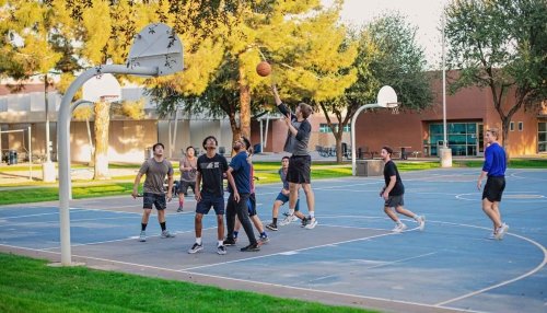 students playing basketball