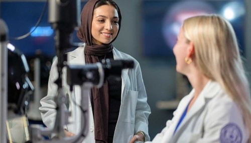 Two Students in an optometry lab