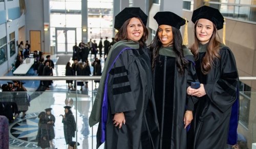 grads with gowns