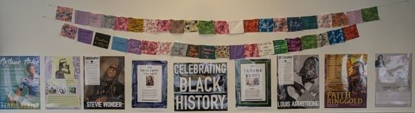 Black history month posters decorating the walls in the cafeteria.